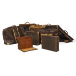 A collection of Louis Vuitton luggage, comprising: a Louis Vuitton briefcase, monogram print