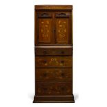 An Edwardian mahogany and inlaid cupboard, with overall floral and ribbon marquetry decoration, with