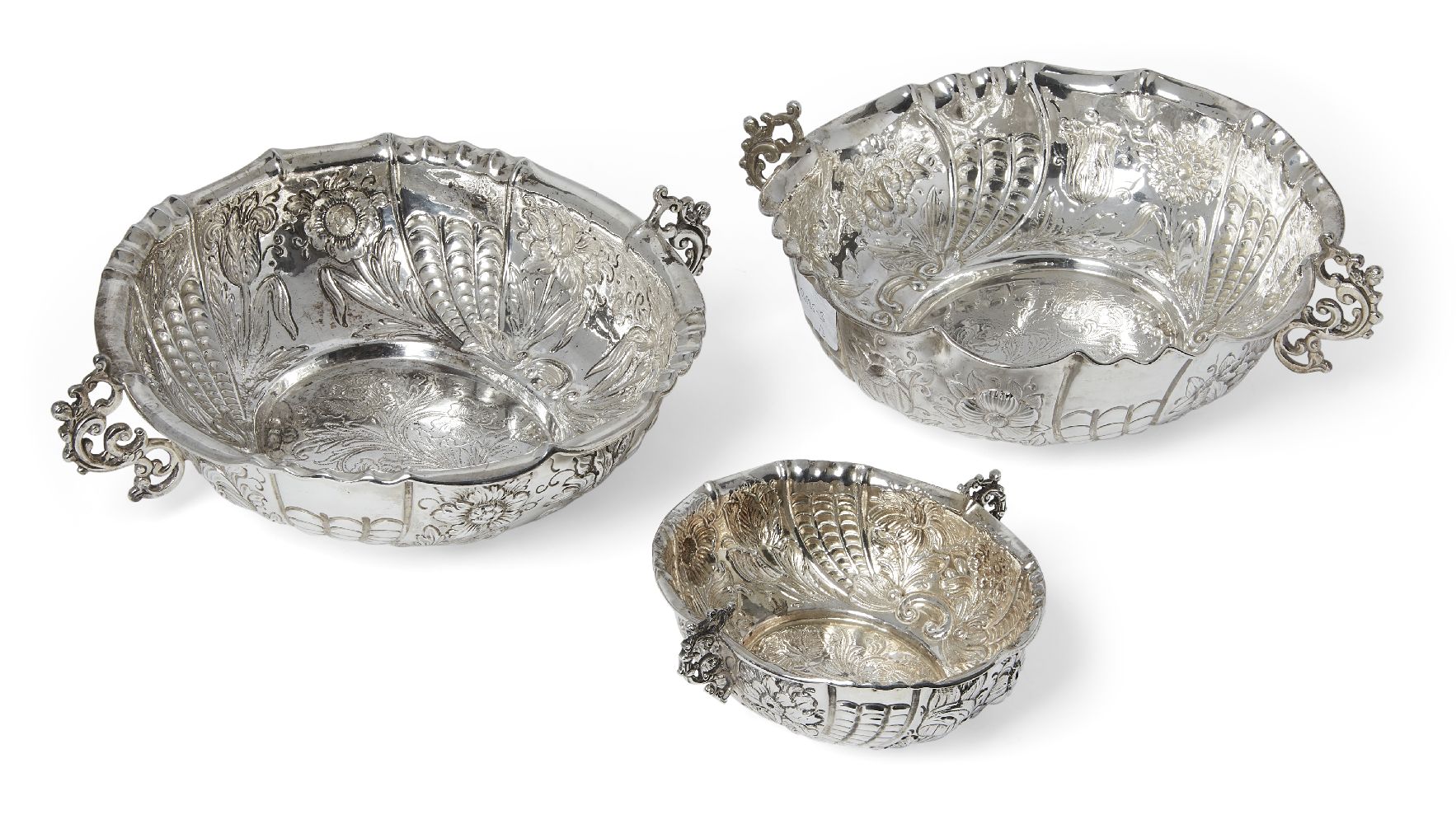 A pair of Victorian silver twin handled bowls, London, c.1886, Charles Stuart Harris, both of oval