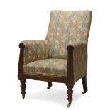 A William IV mahogany open armchair, upholstered in geometric and floral pattern fabric, with