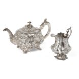 A George III repousse silver teapot, London, c.1818, Solomon Royes & John East Dix, together with