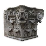 A pair of large limestone Corinthian corner capitals, late 19th century, 66cm high, 72cm wide,