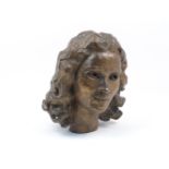 A bronze portrait bust of Deidre, in the style of Sir Jacob Epstein (1880-1959), unsigned, 37cm