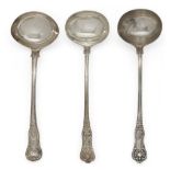 Three silver soup ladles, one Dublin, c.1827, Thomas Farnett; of King's pattern design with armorial