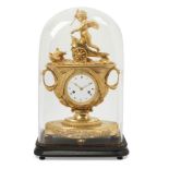 An Empire ormolu mantel clock, c.1810, the case modelled as a vase with swan handles topped by Cupid