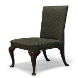 A George II mahogany side chair, with square back and seat, upholstered in green Damask pattern