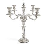 A large silver plated candelabra candlestick, c.1840, the baluster stem raised on a lobed foot