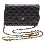 A Chanel clutch bag, the rectangular form black leather body designed with central Chanel logo and