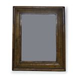 A William and Mary style walnut wall mirror, 19th Century, of rectangular form with cushion