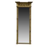 A Victorian gilt gesso pier mirror, the moulded cornice above frieze with fruiting vine