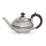 A small silver teapot, London, c.1922, Charles Boyton & Son Ltd, of globular form with two reeded