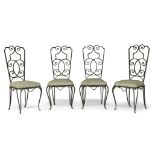 A set of four wrought iron and green painted chairs in the manner of Jean Charles Moreux, 20th