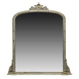 A large Victorian silvered over mantle mirror, of rectangular form, with rounded upper corners,