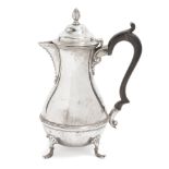 An Edwardian silver coffee pot, London, c.1901, William Hutton & Sons, the rounded body raised on
