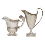 Two silver cream jugs, one Chester, c.1896, Florence Warden, of helmet design and raised on a square