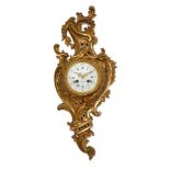 A French Louis XV style gilt-bronze cartel clock, late 19th century, the case of scrolling foliate