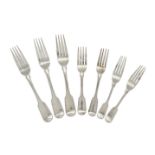 A harlequin set of nine Irish silver table forks, of fiddle pattern design with makers including: