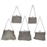 Five silver chain mesh bags, each with snap clasps and chain handles, one hallmarked London, c.1903,