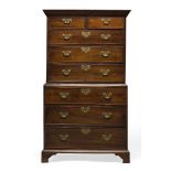 A George III mahogany chest on chest, the moulded cornice above two short and six long graduated