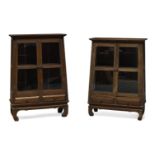 A near pair of Chinese hardwood and glazed cabinets, 20th Century, each of tapering form, with two