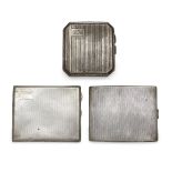 Three silver cigarette cases, each with push button thumb piece, the oldest, Birmingham c.1924,