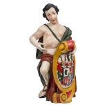A Northern European polychrome decorated carved wood figure of a shield bearer, 19th century,
