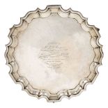 A presentation silver salver, Chester, c.1924, Barker Brothers, with shaped pie crust rim to