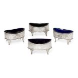 Four late Georgian salts with blue glass liners, London, c.1799, John Gold, each oval silver body
