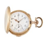 A late 19th century continental gold minute repeating hunter case stop watch, the white enamel