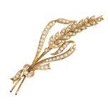 An Edwardian, gold, seed pearl brooch, of ear of wheat design with ribbon binding, c.1905, length