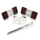 Two stainless steel purse / travel quartz alarm watches, a silver ballpoint pen and a silver book