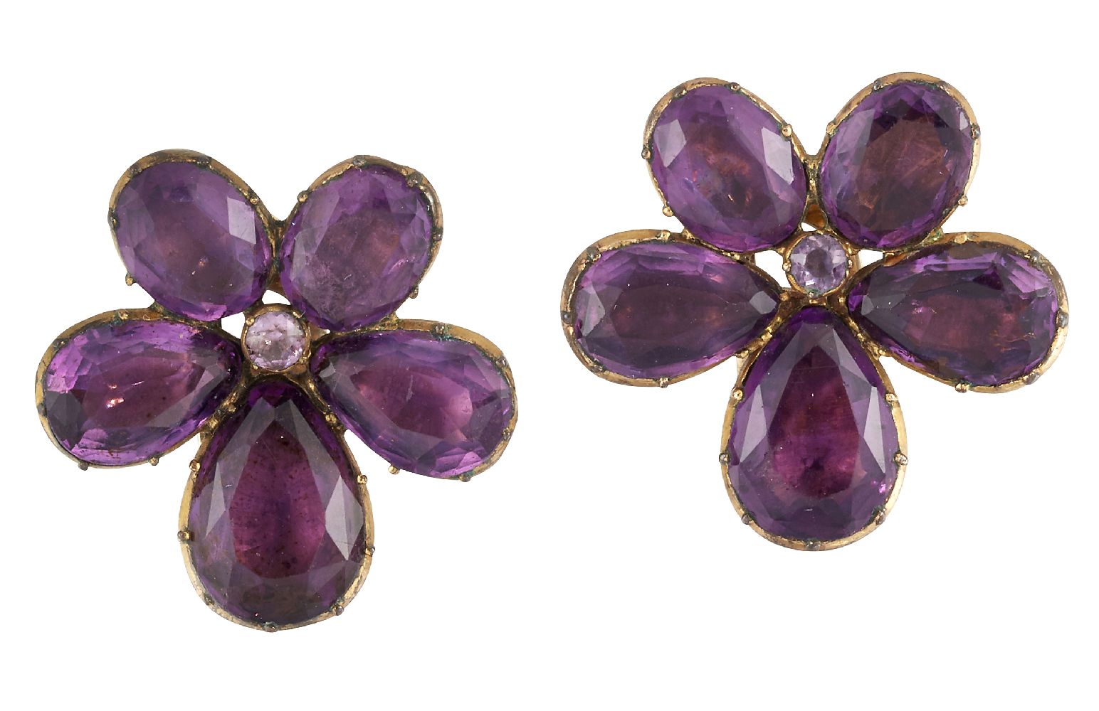 A pair of Georgian gilt metal foiled purple paste earclips, of flowerhead cluster design, each