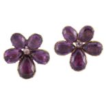 A pair of Georgian gilt metal foiled purple paste earclips, of flowerhead cluster design, each