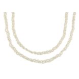 A seed pearl sautoir, designed as three plaited strands of strung seed pearls with seed pearl tassel
