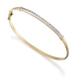 A diamond-set bangle, set to the front with a line of single-cut diamonds, internal diameter 6.