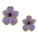 Two diamond, amethyst and enamel flower brooches, each graduating in size, with central claw-set