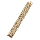 A mesh bracelet, with scroll, textured bead and disc detail, length 18.0cmindistinct marks,