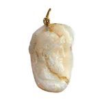 A carved opal pendant, carved as a cameo depicting the profile of a classical, helmeted and