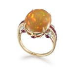 An opal, ruby and diamond ring, the oval cabochon ruby to square-cut ruby line shoulders with