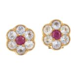 A pair of synthetic ruby and colourless gem earrings, of flowerhead cluster design, each circular