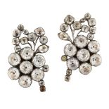 A pair of Georgian silver, foiled paste earclips, of floral spray design set throughout with vari-