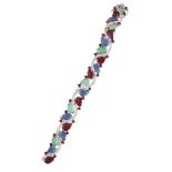 A diamond and gem bracelet, composed of a series of leaf carved emeralds, rubies and sapphires