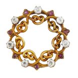 A late 19th century Russian gold, diamond and ruby brooch, of entwined garland design set at