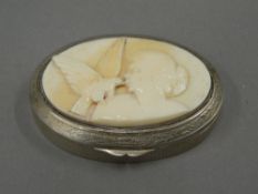 A late 19th/early 20th century ivory mounted 800 silver box