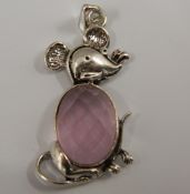 A silver mouse pendant