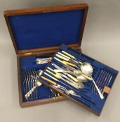A canteen of containing various plated cutlery
