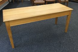 A small oak boardroom type table