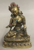 A bronze model of Buddha