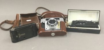 Three vintage cameras