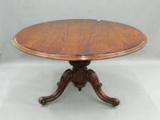 A Victorian mahogany tilt top centre table